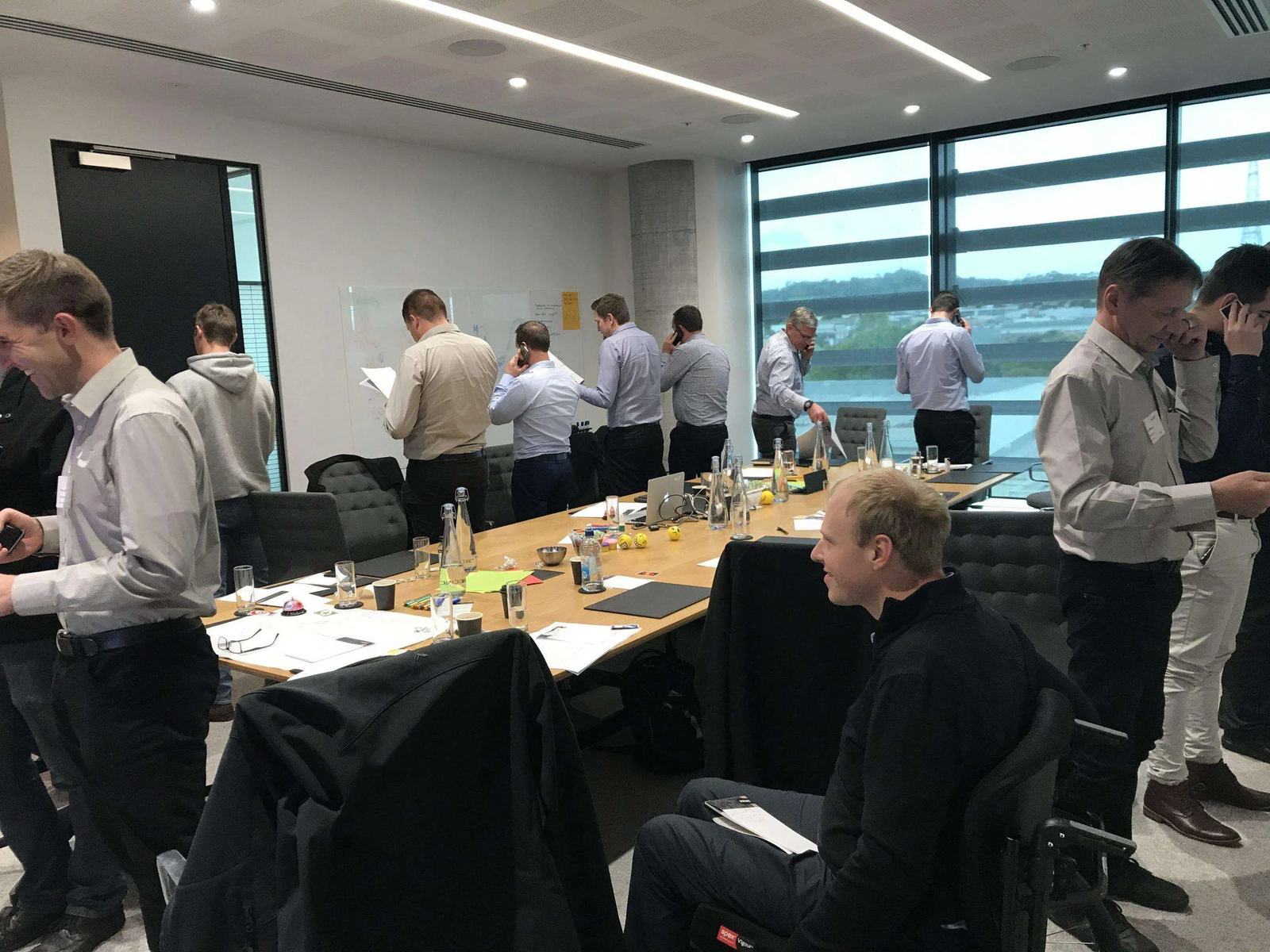 Bernadette McClelland coaching cold calling in real time with the Omni Group team